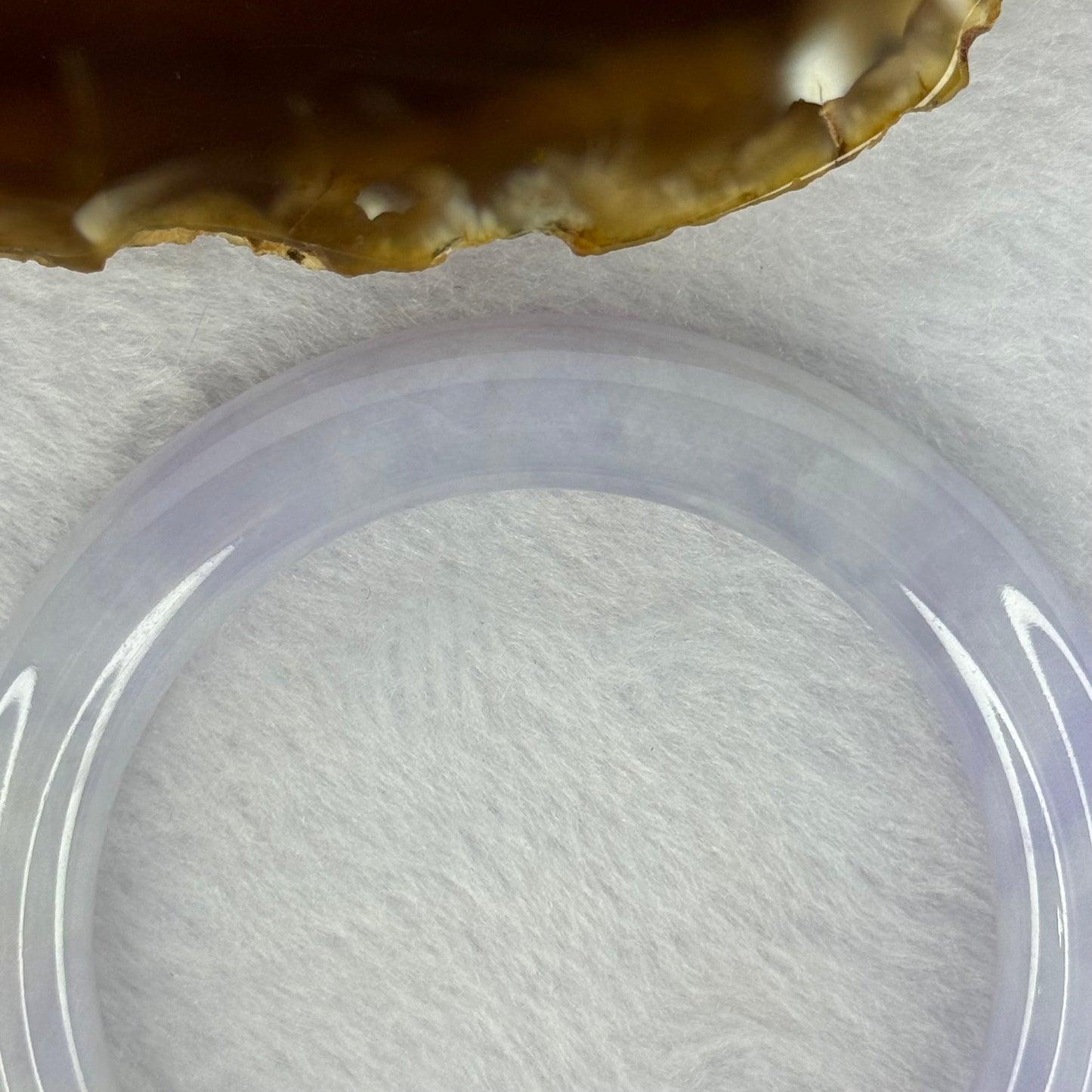 Type A Faint Lavender with Bright Lavender and Brownish Orange Jadeite Bangle 58.04g 290.29cts Internal Diameter 54.5mm 10.5 by 10.5 With NGI Cert No 32880442 (Slight Internal Line)