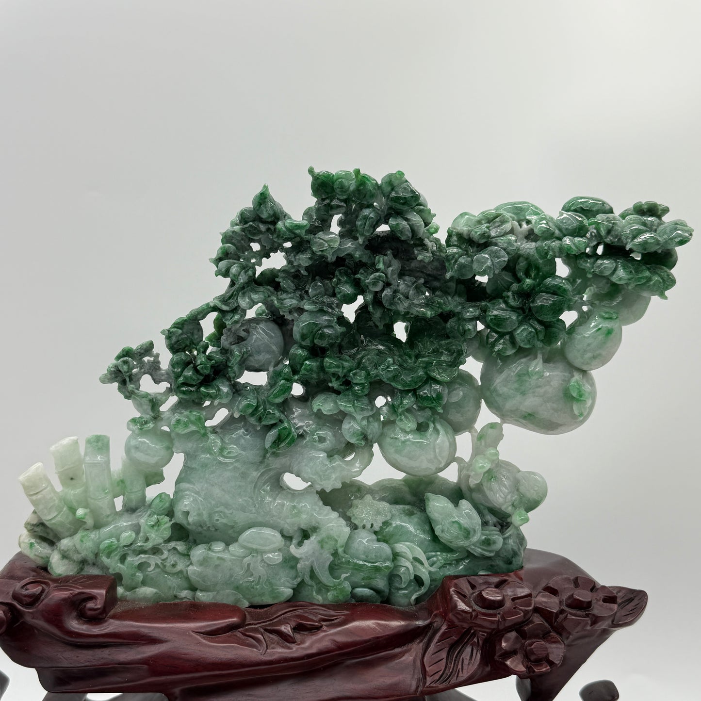 Type A Light Green with Spicy Green and Apple Green Patches Jadeite Tree with Twin Birds and Bamboo Display 1260g 24.0 by 2.8 by 16.0cm with wooden stand 2935g 31.0 by 10.0 by 28.0cm