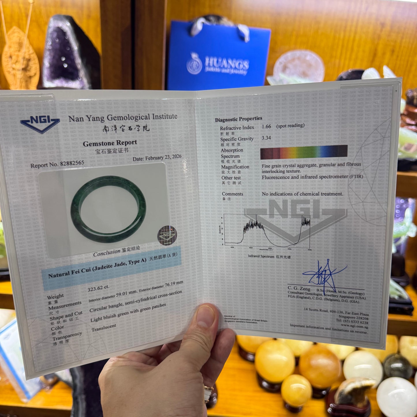 Certified Type A Natural Green with Emerald Green Patches Jadeite Bangle 323.63ct 64.72g Inner Diameter 58.9mm Thickness 13.0 by 8.5mm (Close to Perfect) with NGI Cert