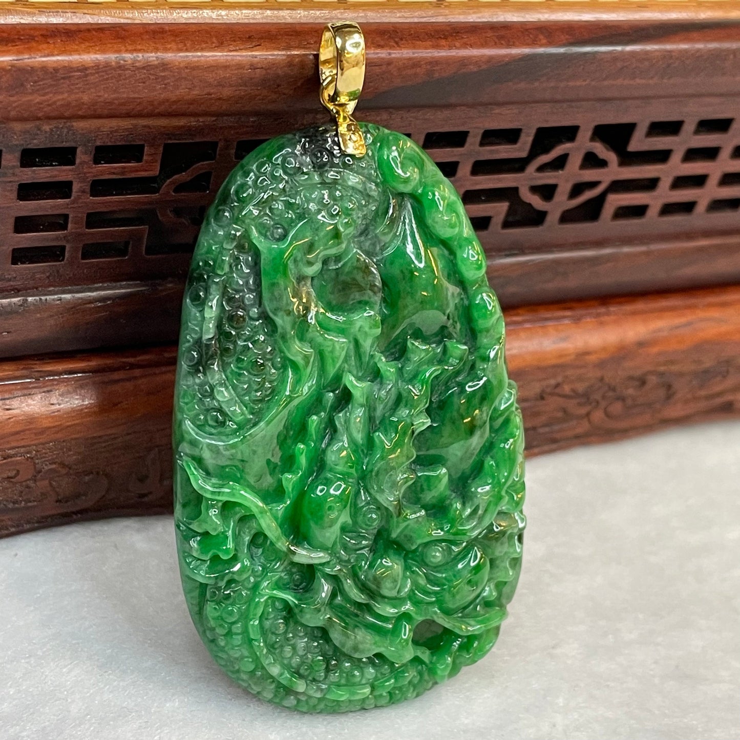 18K Yellow Gold Rare Type A Old Mine Lao Keng Spicy Green with Dark Green Patches Jade Jadeite Prosperity Dragon Feng Shui Pendant with NGI Cert 142.63 cts 57.91 by 36.09 by 7.43mm