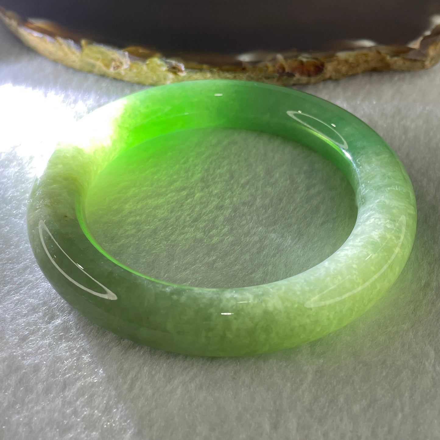 Type A Natural Jelly Full Green with Emerald Green Patches Jadeite Bangle 78.56g Inner Diameter 57.2mm 11.8 by 12.6mm (Close to Perfect)