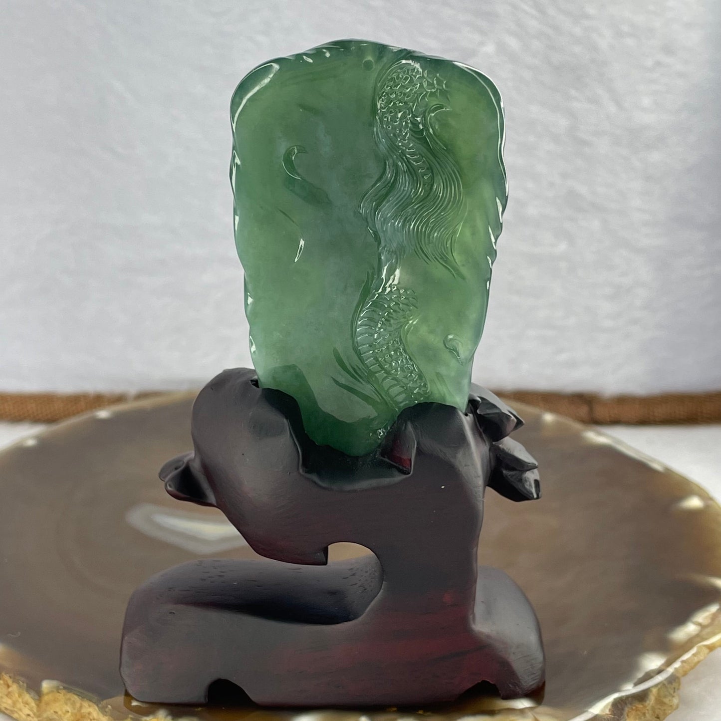 Very Rare High Icy Grand Master Type A Blueish Green Jadeite Fire Dragon with Fortune Wheel 53.03g 73.4 by 38.7 by 11.5mm with Wooden Stand