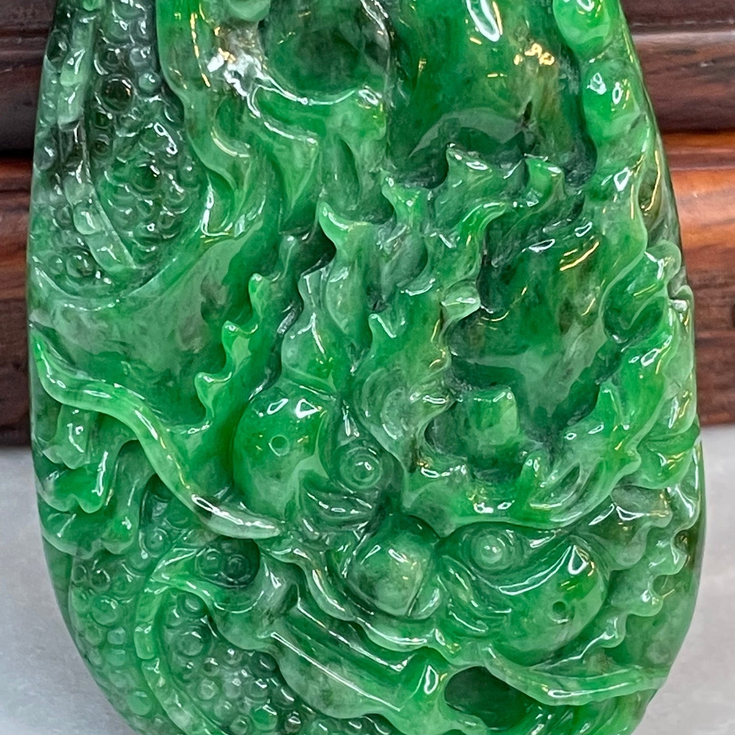 18K Yellow Gold Rare Type A Old Mine Lao Keng Spicy Green with Dark Green Patches Jade Jadeite Prosperity Dragon Feng Shui Pendant with NGI Cert 142.63 cts 57.91 by 36.09 by 7.43mm