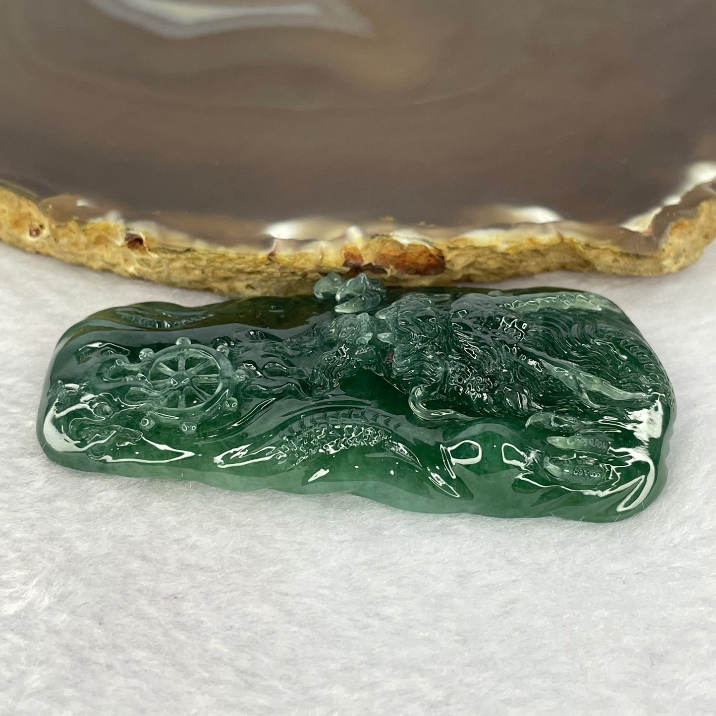 Very Rare High Icy Grand Master Type A Blueish Green Jadeite Fire Dragon with Fortune Wheel 53.03g 73.4 by 38.7 by 11.5mm with Wooden Stand