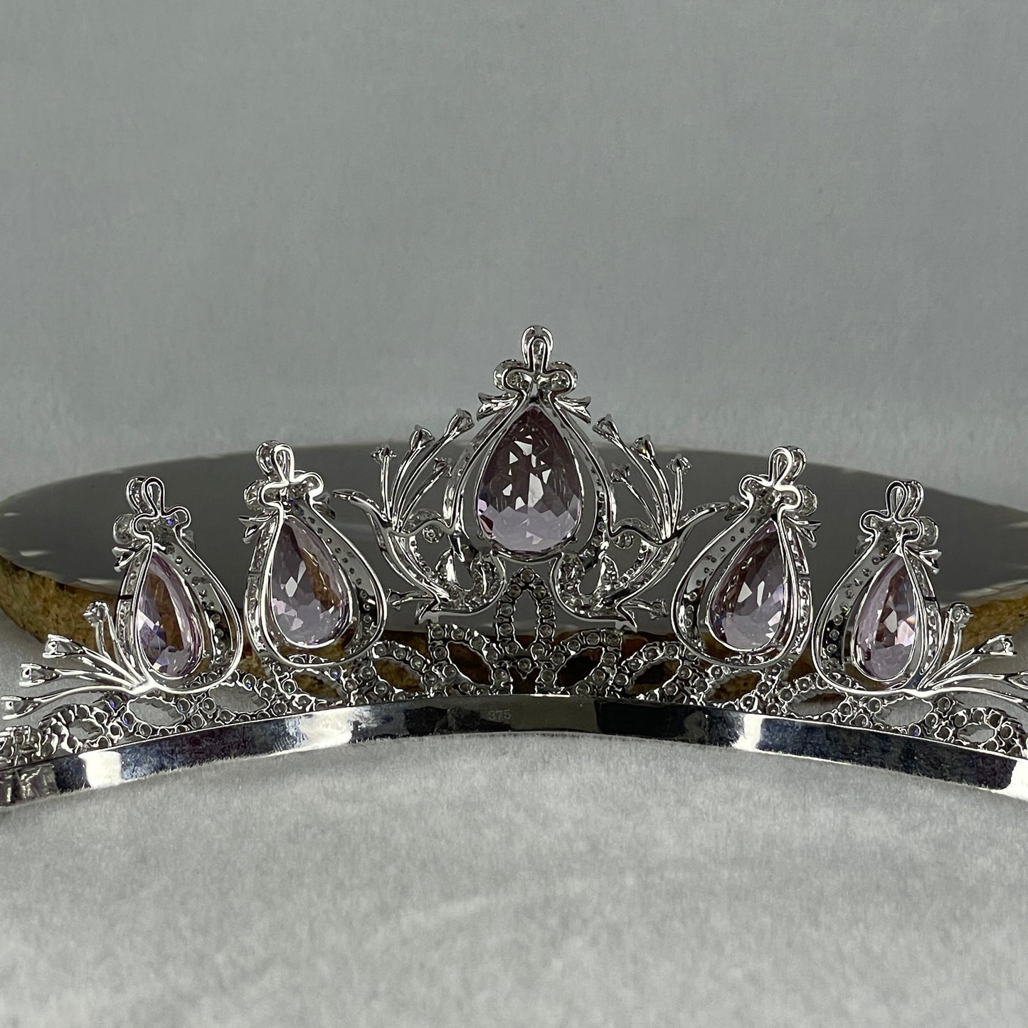 Natural Purplish Pink Kunzite 45.24cts Natural Diamonds D15.0cts in 9K White Gold 53.09g Tiara Total 64.04g