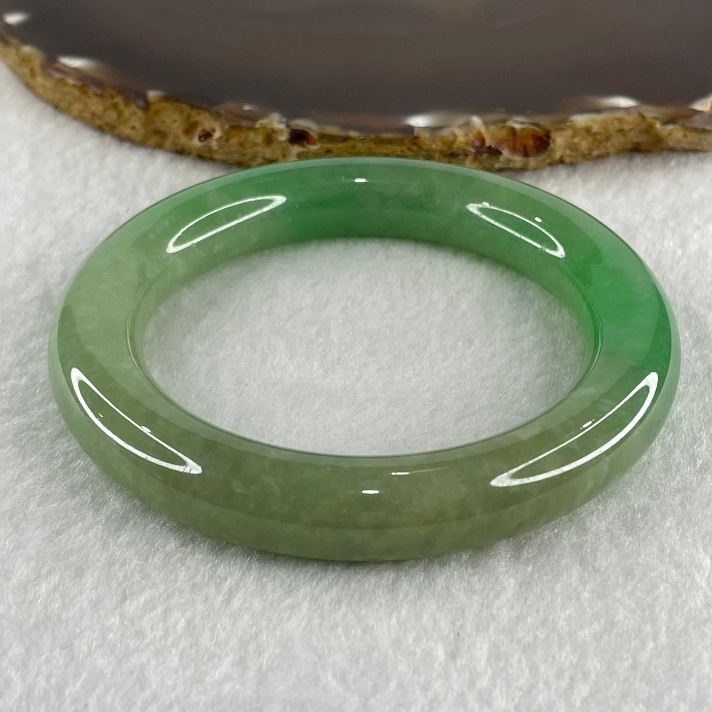 Type A Natural Jelly Full Green with Emerald Green Patches Jadeite Bangle 78.56g Inner Diameter 57.2mm 11.8 by 12.6mm (Close to Perfect)