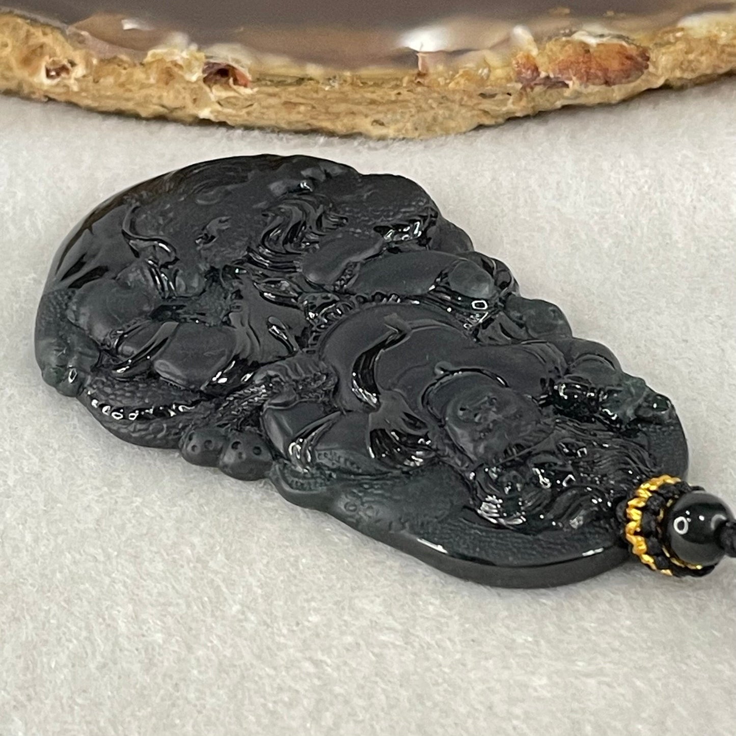 Rare Grand Master Type A Fully Translucent Black Omphacite Jadeite Da Hei Tian Daikokuten God of Fortune 大黑天 Pendant 26.52g 59.4 by 38.7 by 5.2mm