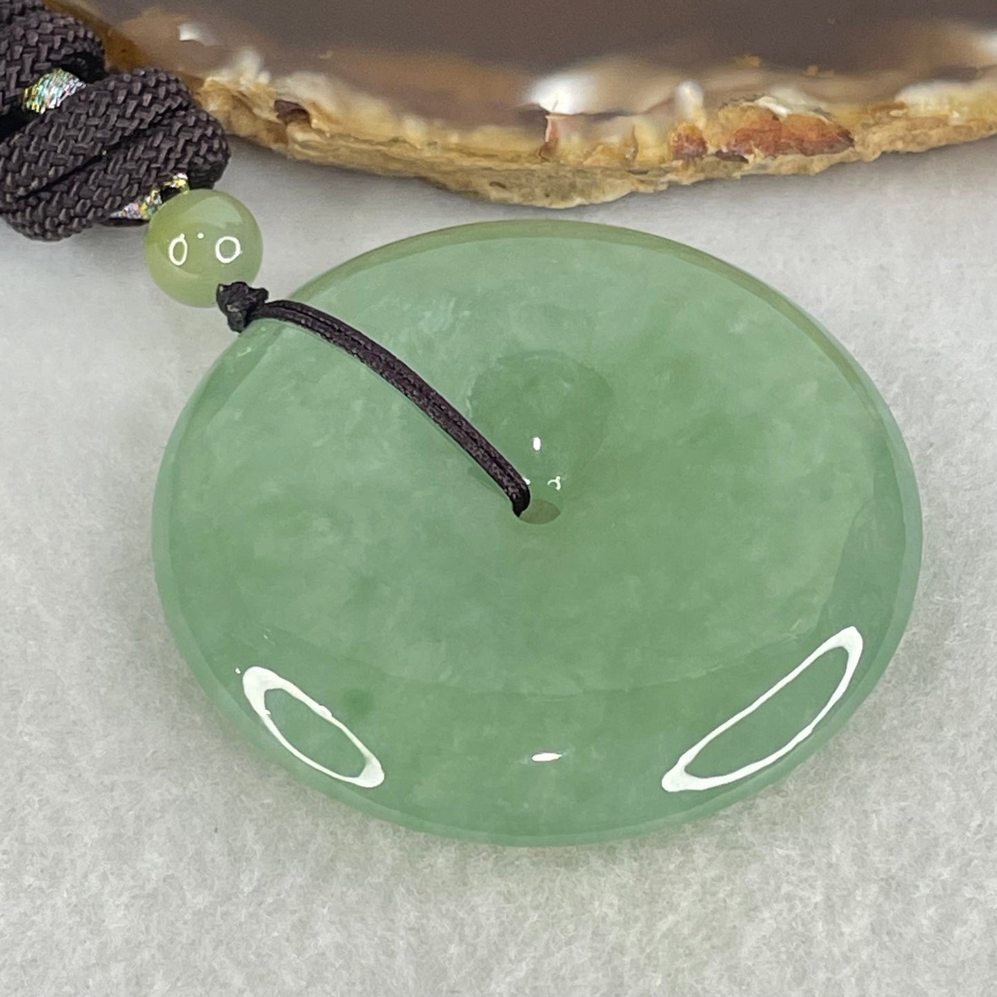 Type A Semi Icy Blueish Green Jadeite Ping An Kou Donut Pendant 48.87g 49.6 by 10.0mm (Perfect)