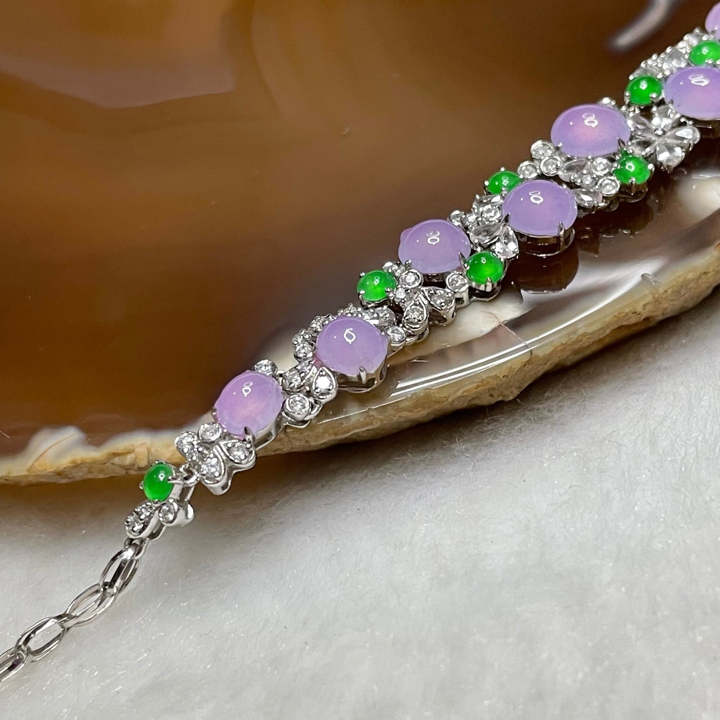 RARE Type A Semi Icy Lavender & Green Jade Jadeite Bracelet 18k white gold, natural diamonds & sapphires 7.23g Dimensions of middle piece: 88.2 by 9.2 by 4.7mm Length of Bracelet: 16cm