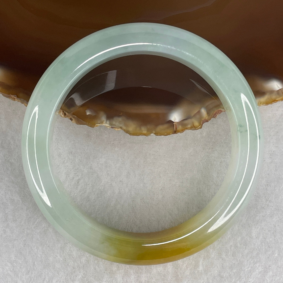 NGI Certified Very High Grade Natural Type A Semi Icy Blueish Green with Yellowish Brown Patches Jadeite 59.58g Inner Diameter 54.30mm 12.6 by 8.6mm (Very Very Slight Internal Line)