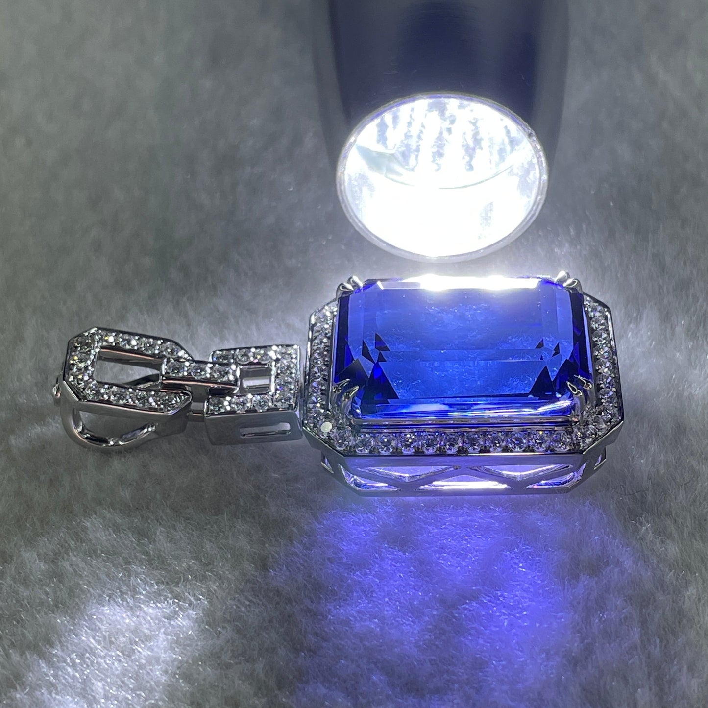 Very High Grade Natural Blue Tanzanite 35.93ct 21.79 by 16.03 by 10.69mm Natural Diamonds 1.27ct Au750 White Gold Pendant Total 20.64g with GIA Cert