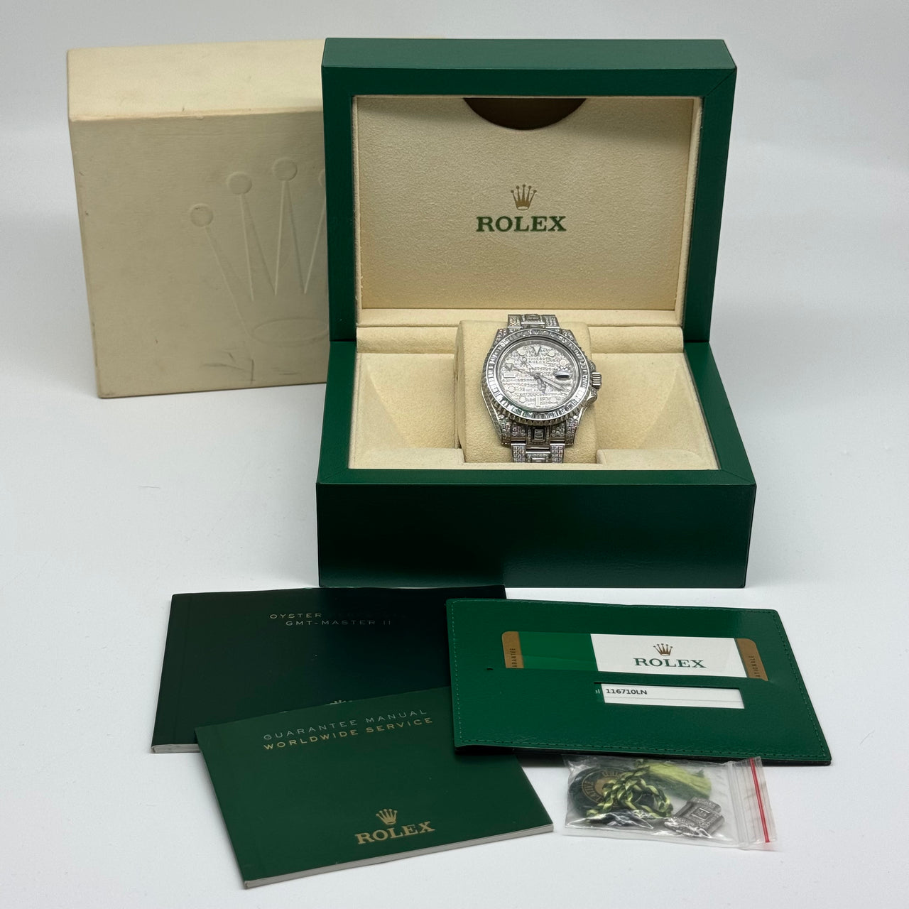 Sovereign Horology: Pre-Owned Rolex GMT-Master II "Custom Diamond Ice" Edition (Model 116710LN) – A Monument of Precision, Power, and Radiant Authority Dec 2017 with Box and Card