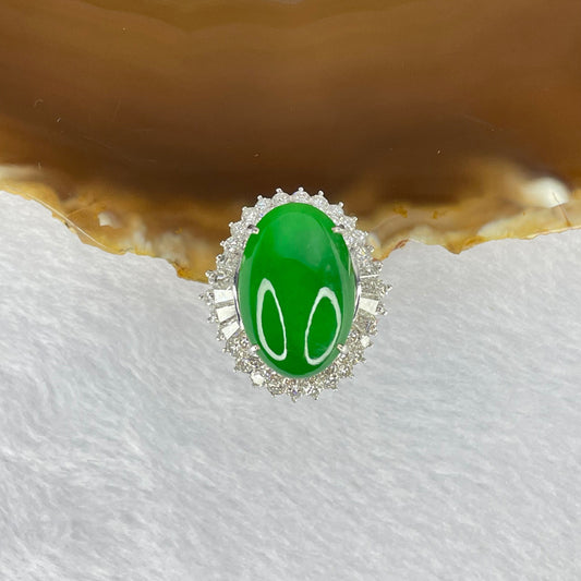 Very Very High Quality Highly Translucent TYPE A Natural Full Intense Green Jadeite Traded as Imperial Green Oval Cabochon Approx. 20.93 by 13.95 by 6.58mm Total Weight 13.60g including Natural Diamonds and 13K White Gold Ring Setting US7.75 HK17 NGI Cert