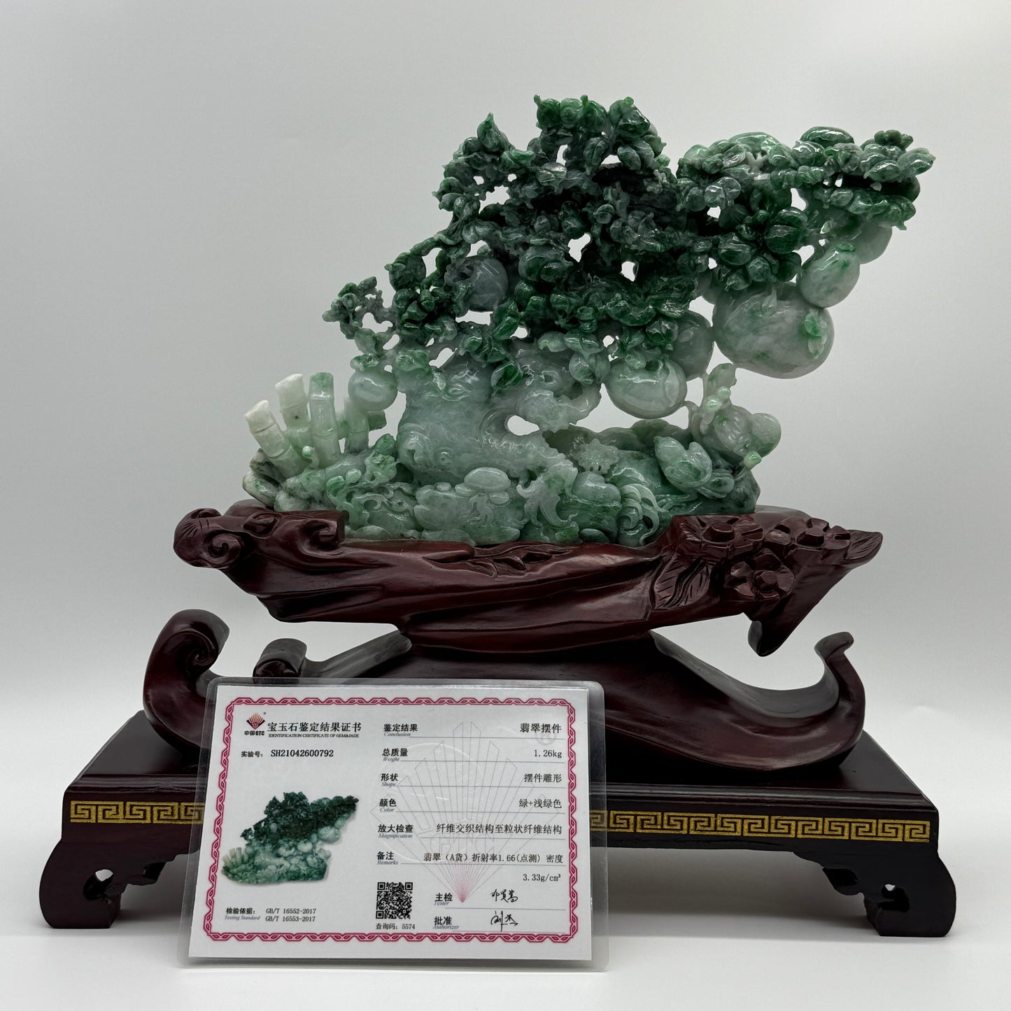 Type A Light Green with Spicy Green and Apple Green Patches Jadeite Tree with Twin Birds and Bamboo Display 1260g 24.0 by 2.8 by 16.0cm with wooden stand 2935g 31.0 by 10.0 by 28.0cm