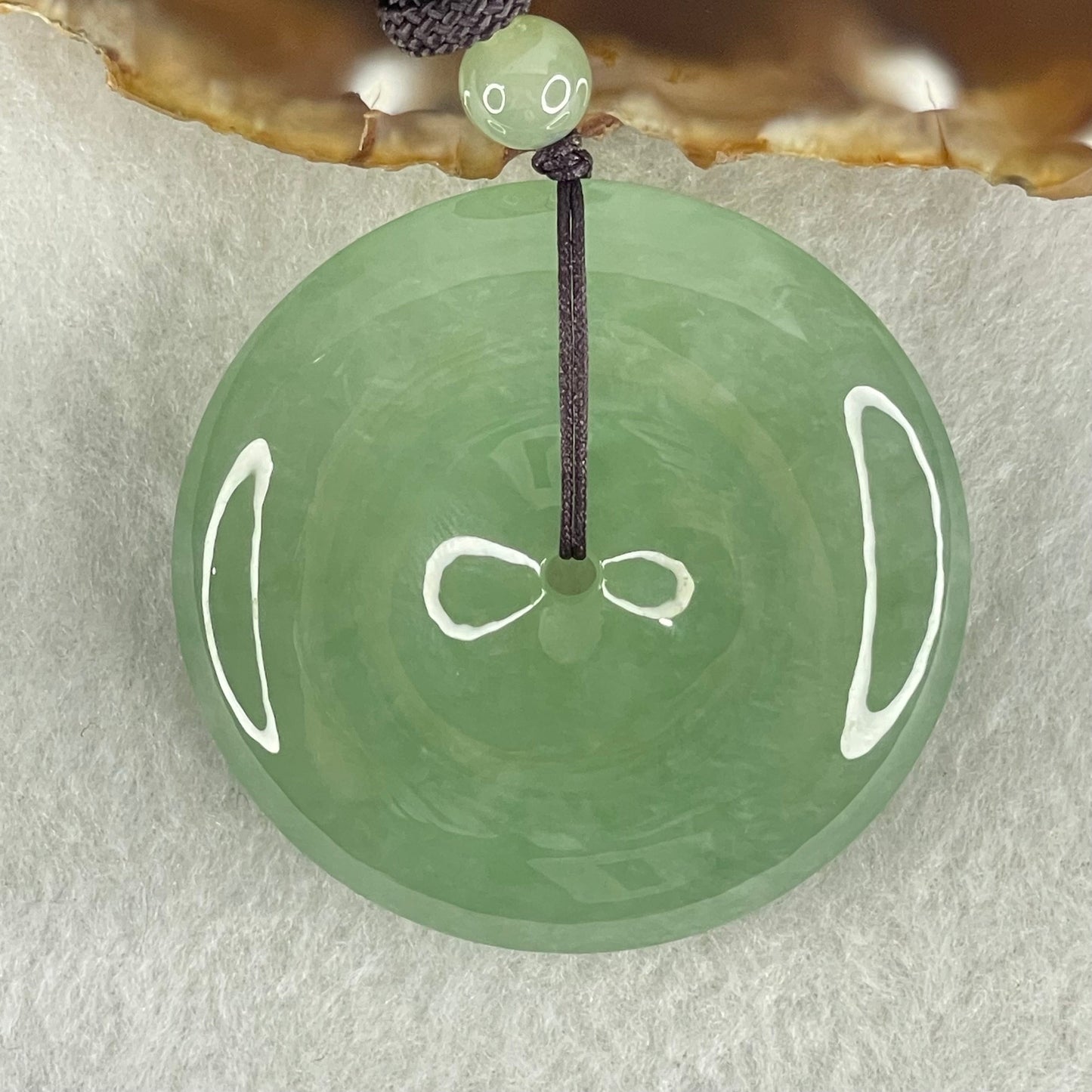 Type A Semi Icy Blueish Green Jadeite Ping An Kou Donut Pendant 48.87g 49.6 by 10.0mm (Perfect)
