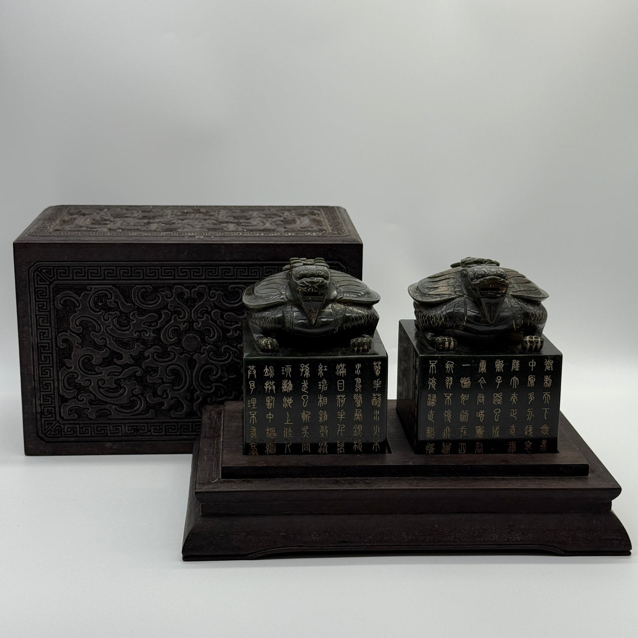 Rare Antique Qing Imperial Style Natural Old Mine Dark Green Nephrite Dual Dragon Turtle Seal Set in Zitan Dragon Carvings Box Total Weight 4,853.2g 205.5 by 190.0 by 140.0mm each seal about 1,719.5g 84.7 by 82.3 by 113.1mm