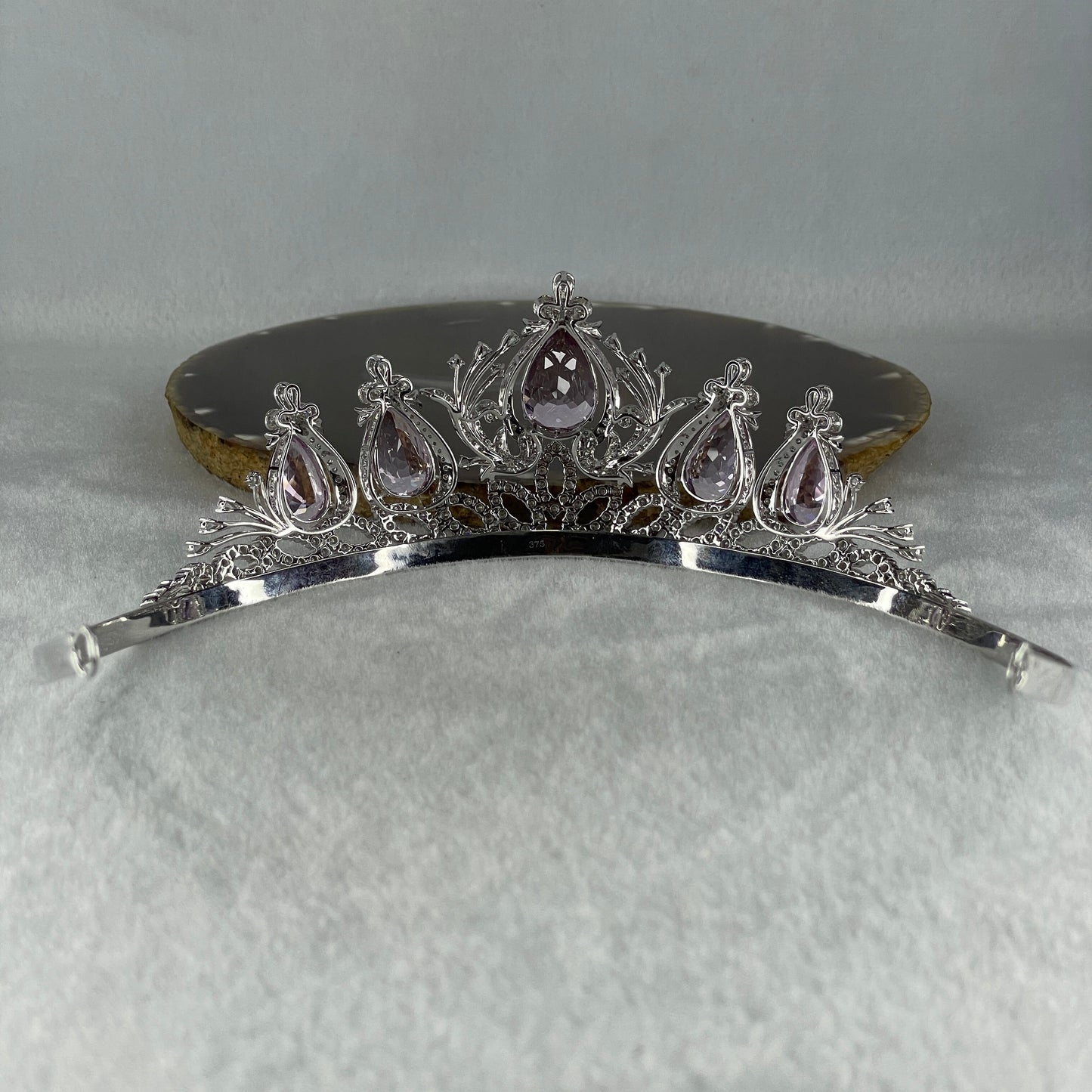 Natural Purplish Pink Kunzite 45.24cts Natural Diamonds D15.0cts in 9K White Gold 53.09g Tiara Total 64.04g