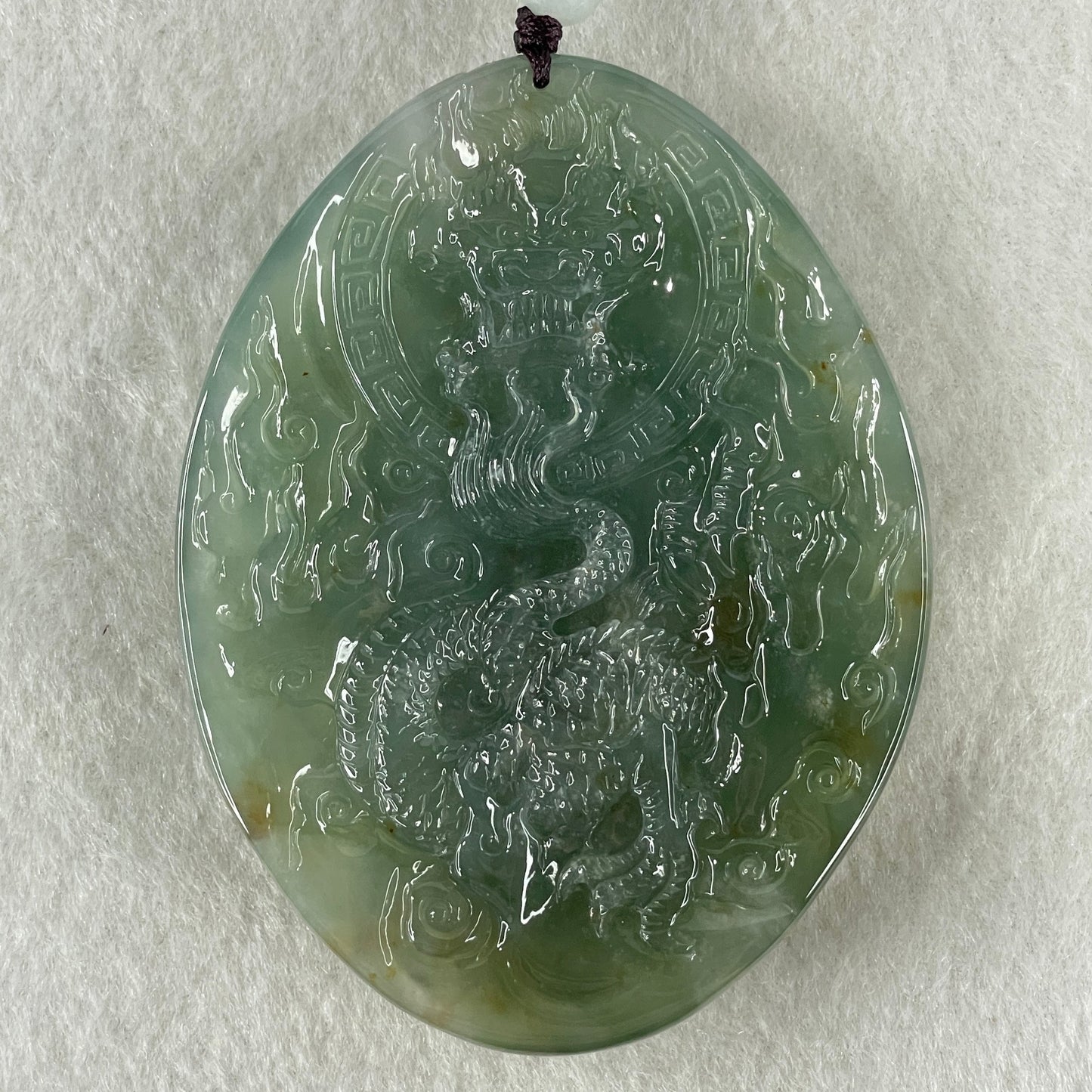 Grand Master Type A Icy Blueish Green with Brown Patches Jadeite Acala Pendant 85.25g 75.0 by 56.6 by 12.4mm