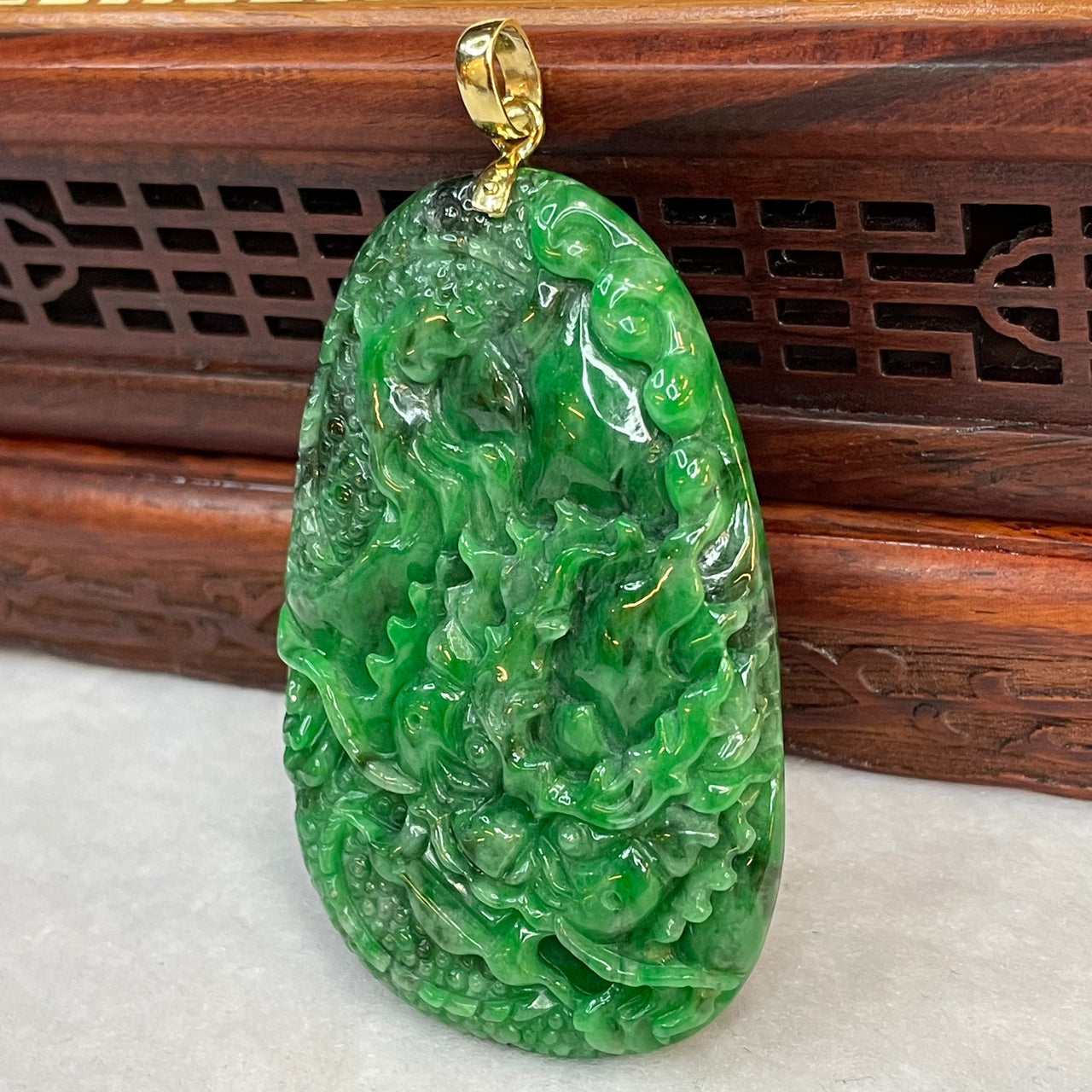 18K Yellow Gold Rare Type A Old Mine Lao Keng Spicy Green with Dark Green Patches Jade Jadeite Prosperity Dragon Feng Shui Pendant with NGI Cert 142.63 cts 57.91 by 36.09 by 7.43mm