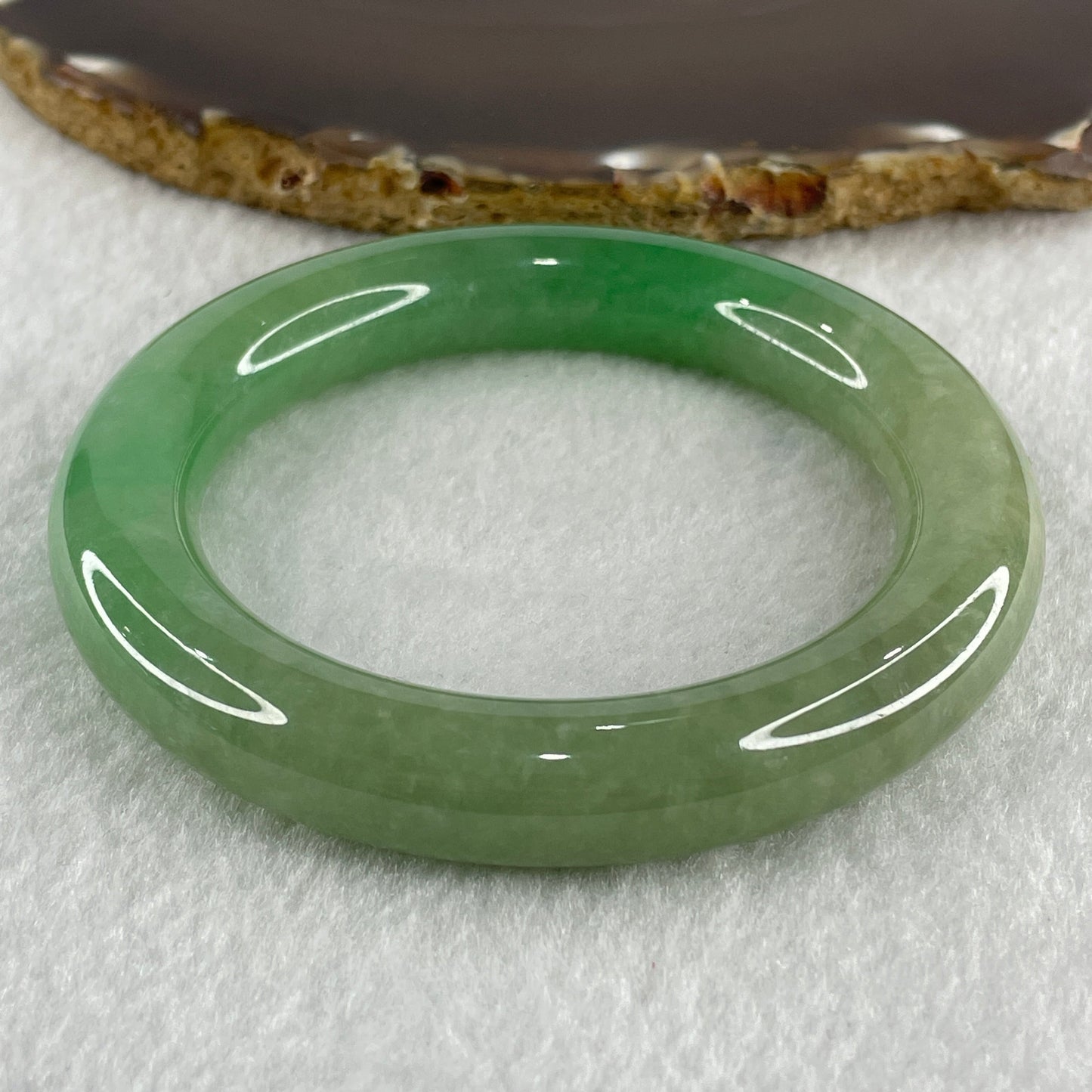 Type A Natural Jelly Full Green with Emerald Green Patches Jadeite Bangle 78.56g Inner Diameter 57.2mm 11.8 by 12.6mm (Close to Perfect)