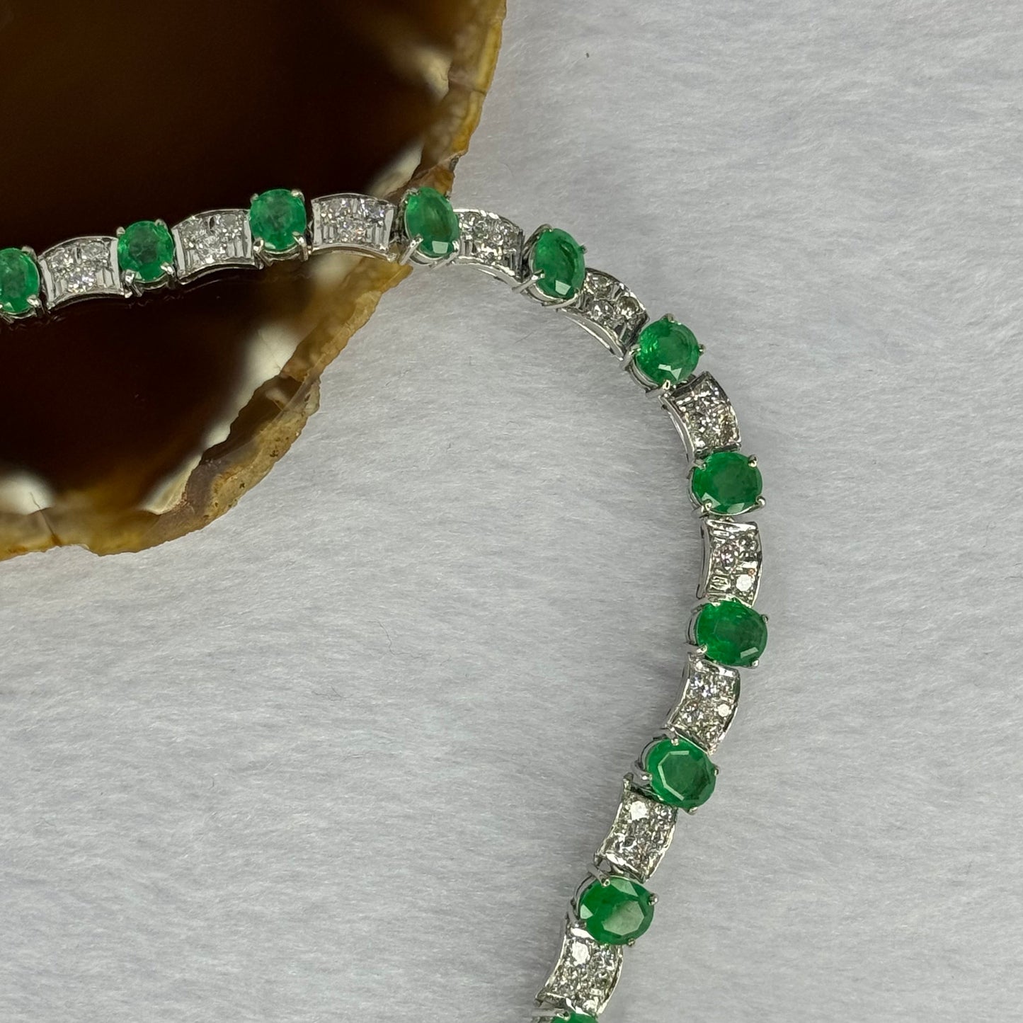 Natural Emeralds (Beryl) 25.0 cts. Total 42.34g including 31 Emeralds, 121 Natural Diamonds in 8k White Gold with NGI Cert No. 82835786
