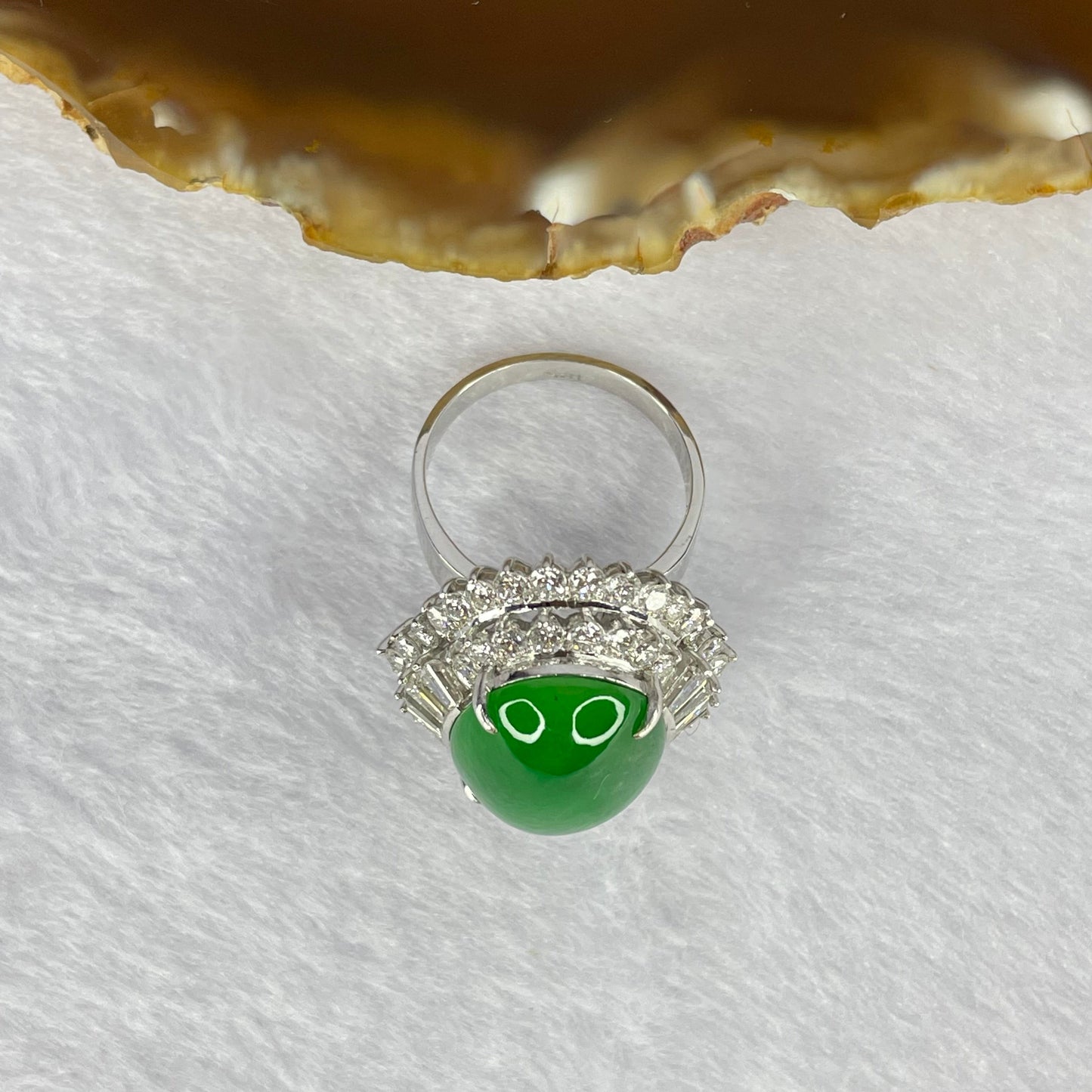 Very Very High Quality Highly Translucent TYPE A Natural Full Intense Green Jadeite Traded as Imperial Green Oval Cabochon Approx. 20.93 by 13.95 by 6.58mm Total Weight 13.60g including Natural Diamonds and 13K White Gold Ring Setting US7.75 HK17 NGI Cert
