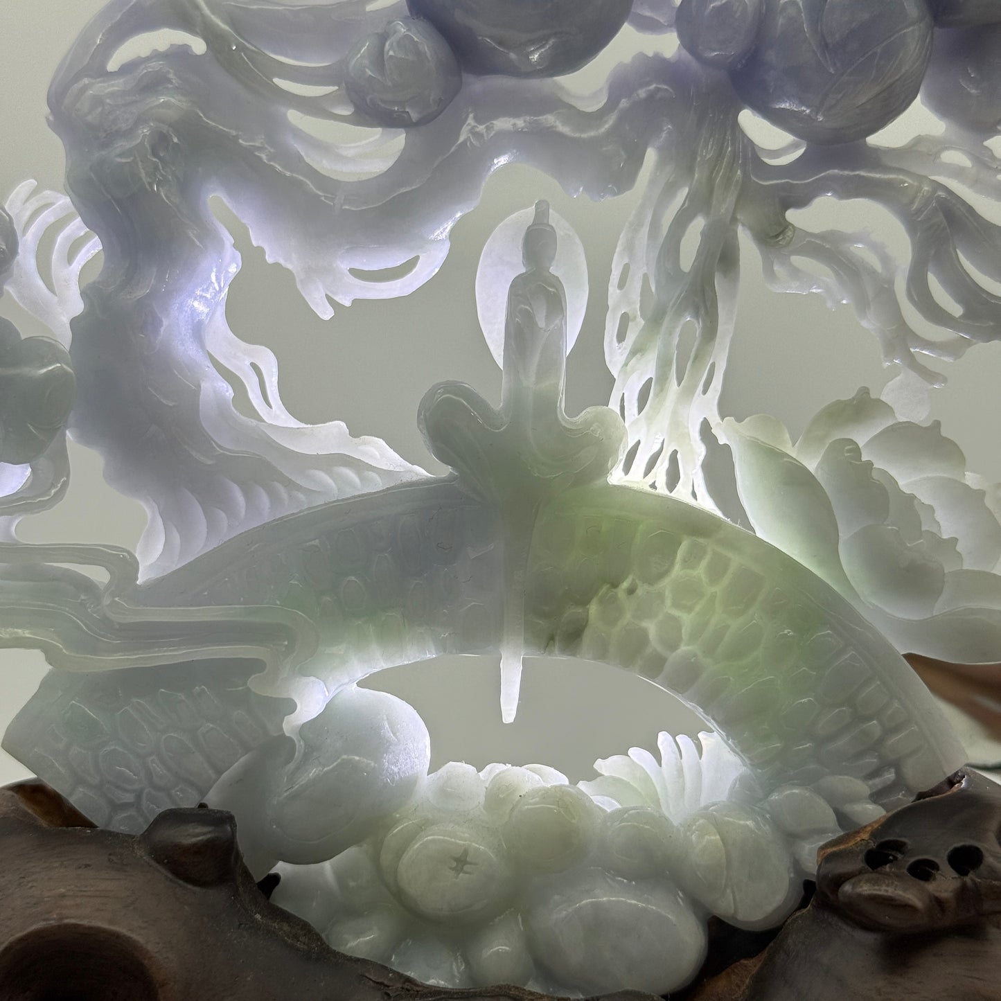 Rare Type A Deep Lavender Jadeite Gui Ren with Longevity Peaches & Lotus 470.0g 23.0 by 19.0 by 1.36cm with wooden stand 2285g 25.0 by 12.0 by 32.0cm