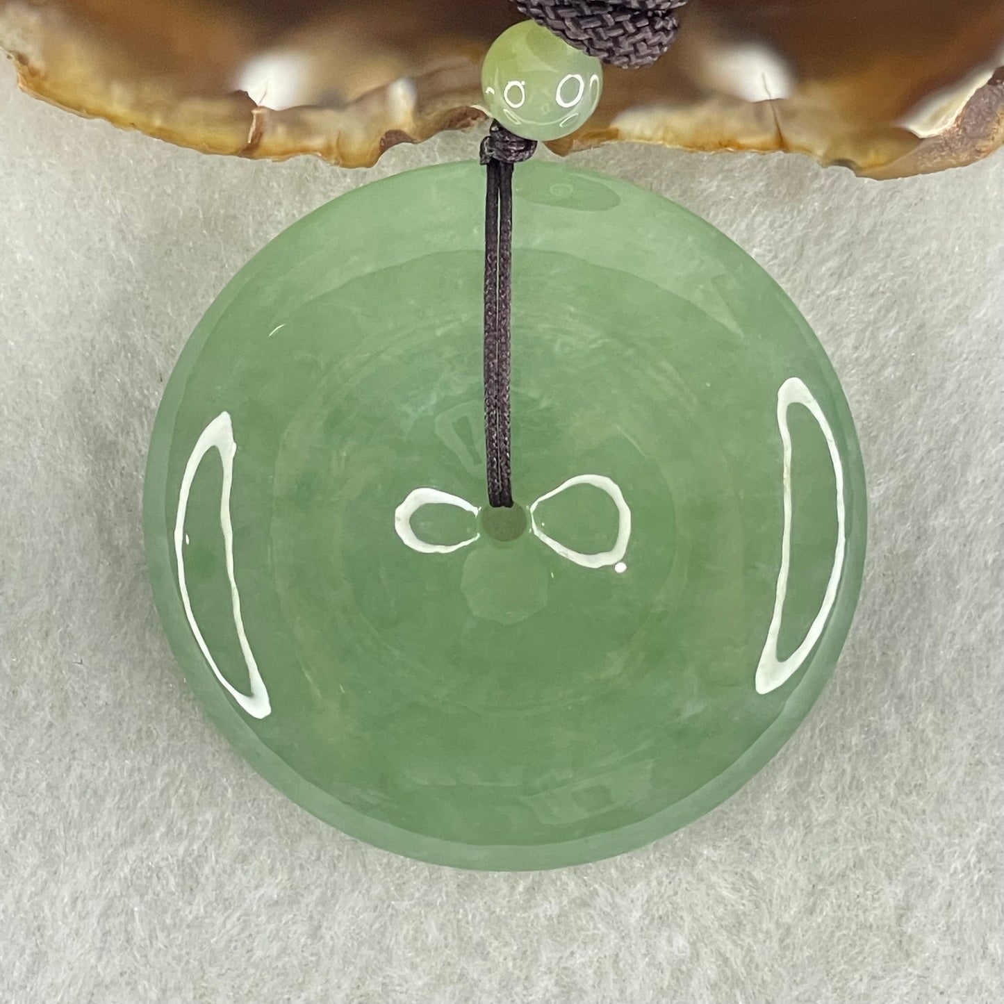 Type A Semi Icy Blueish Green Jadeite Ping An Kou Donut Pendant 48.87g 49.6 by 10.0mm (Perfect)