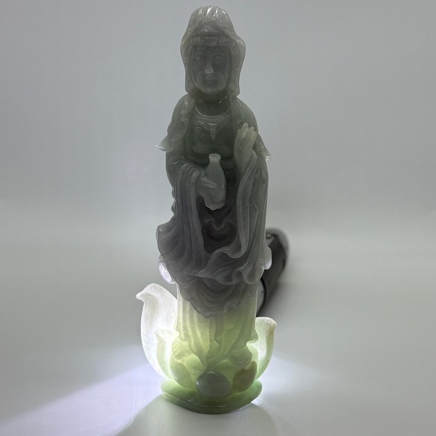 Type A Lavender and Green Jade Jadeite Guan Yin Display 210.5g 142.6 by 53.6 by 24.1mm with wooden stand total 1515g 310 by 152 by 106mm