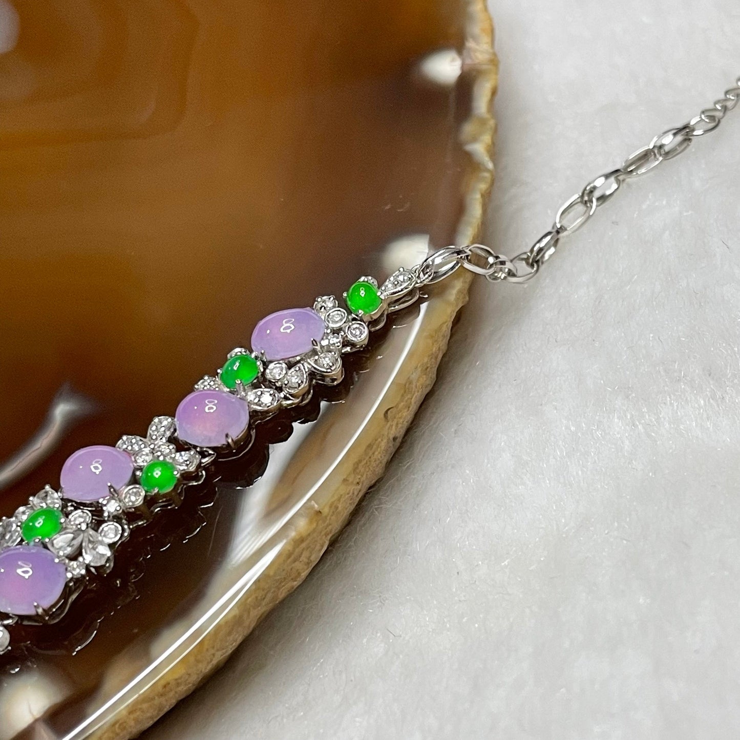 RARE Type A Semi Icy Lavender & Green Jade Jadeite Bracelet 18k white gold, natural diamonds & sapphires 7.23g Dimensions of middle piece: 88.2 by 9.2 by 4.7mm Length of Bracelet: 16cm
