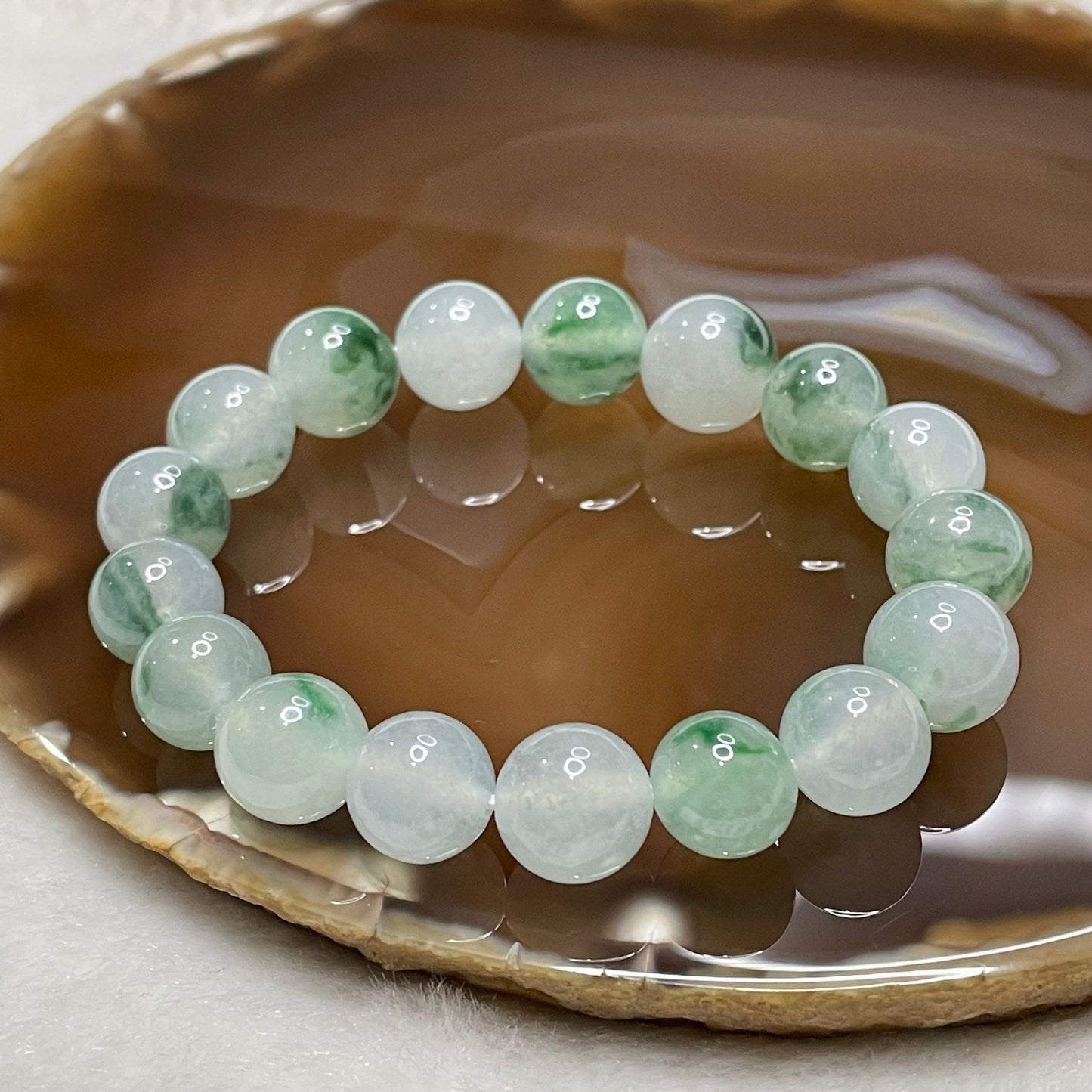 Type A Semi Icy Piao Hua Jade Jadeite Bracelet 40.74g 16cm 12.1mm bead 17 beads