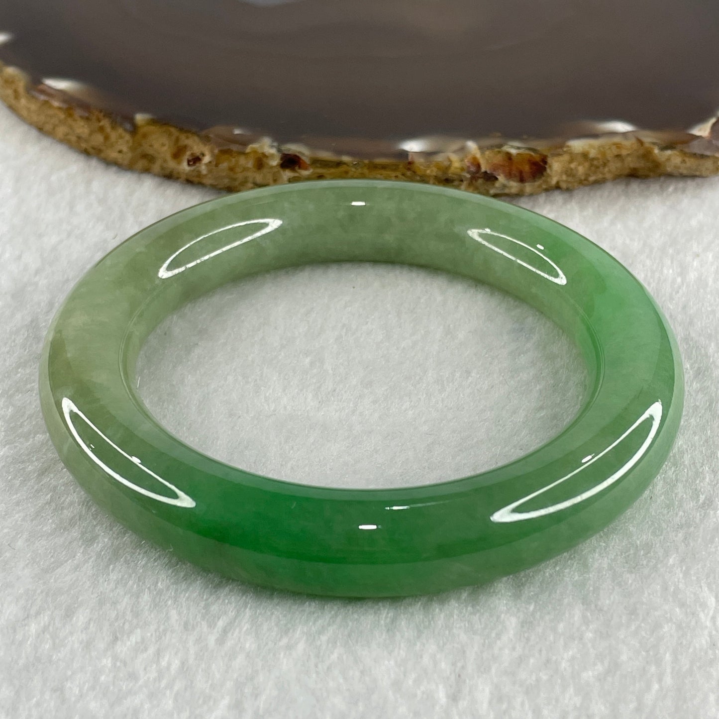 Type A Natural Jelly Full Green with Emerald Green Patches Jadeite Bangle 78.56g Inner Diameter 57.2mm 11.8 by 12.6mm (Close to Perfect)