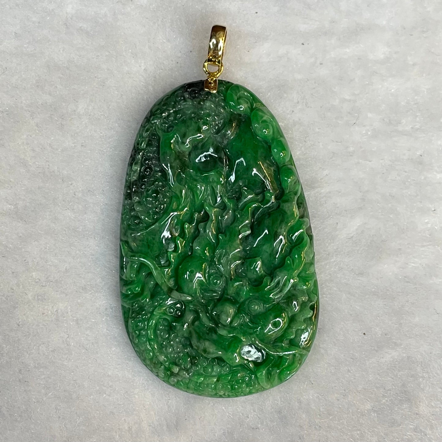 18K Yellow Gold Rare Type A Old Mine Lao Keng Spicy Green with Dark Green Patches Jade Jadeite Prosperity Dragon Feng Shui Pendant with NGI Cert 142.63 cts 57.91 by 36.09 by 7.43mm
