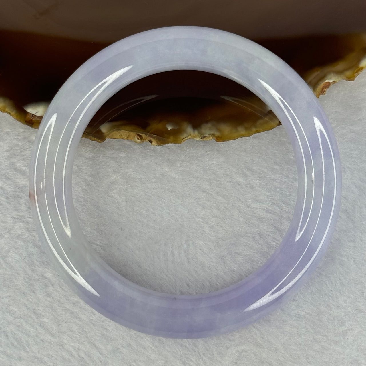 Type A Faint Lavender with Bright Lavender and Brownish Orange Jadeite Bangle 58.04g 290.29cts Internal Diameter 54.5mm 10.5 by 10.5 With NGI Cert No 32880442 (Slight Internal Line)