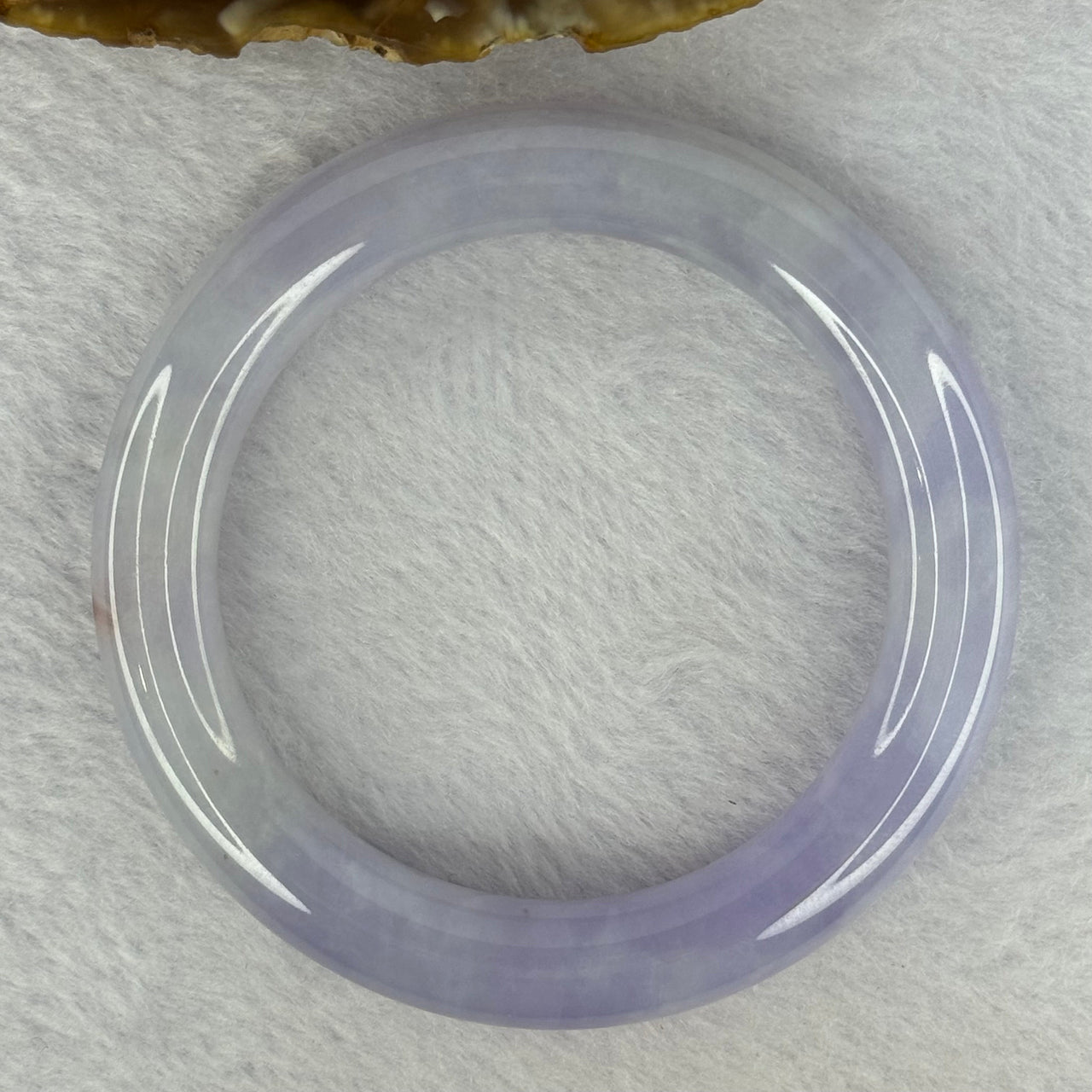 Type A Faint Lavender with Bright Lavender and Brownish Orange Jadeite Bangle 58.04g 290.29cts Internal Diameter 54.5mm 10.5 by 10.5 With NGI Cert No 32880442 (Slight Internal Line)