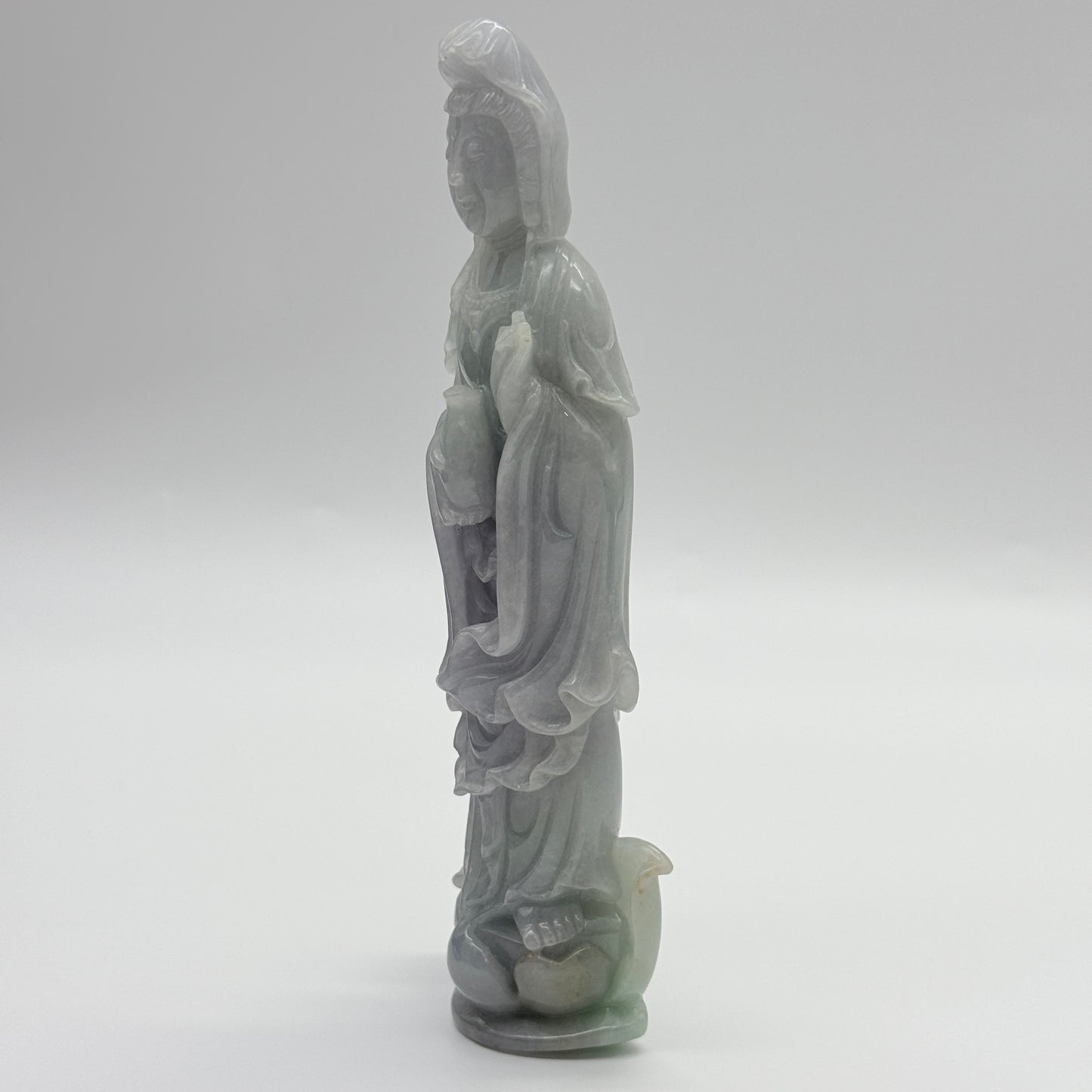 Type A Lavender and Green Jade Jadeite Guan Yin Display 210.5g 142.6 by 53.6 by 24.1mm with wooden stand total 1515g 310 by 152 by 106mm