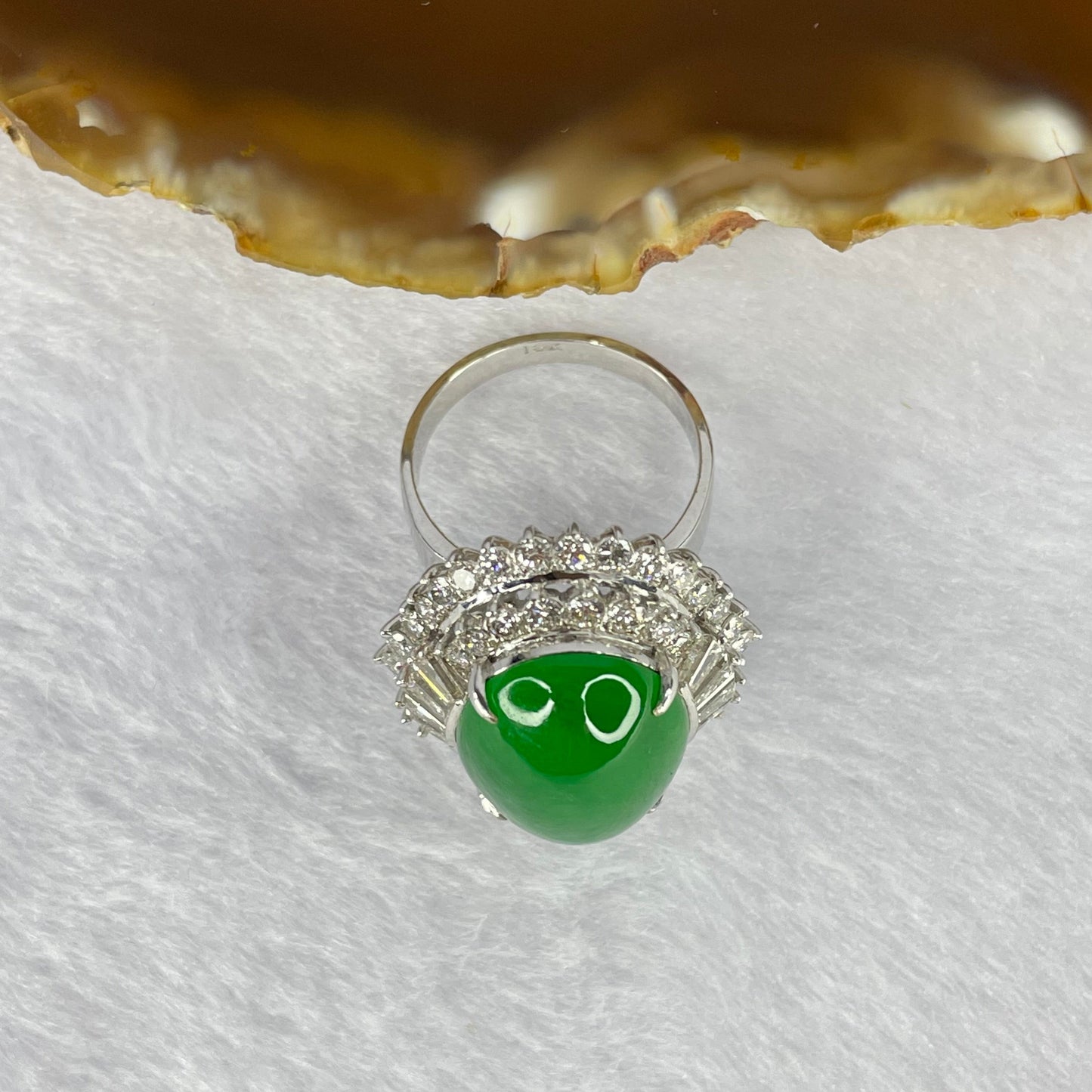 Very Very High Quality Highly Translucent TYPE A Natural Full Intense Green Jadeite Traded as Imperial Green Oval Cabochon Approx. 20.93 by 13.95 by 6.58mm Total Weight 13.60g including Natural Diamonds and 13K White Gold Ring Setting US7.75 HK17 NGI Cert