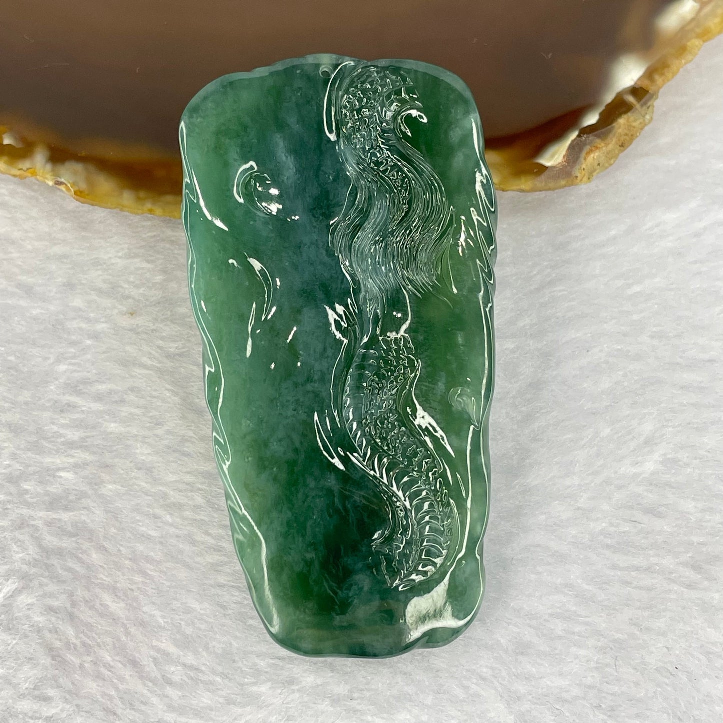 Very Rare High Icy Grand Master Type A Blueish Green Jadeite Fire Dragon with Fortune Wheel 53.03g 73.4 by 38.7 by 11.5mm with Wooden Stand