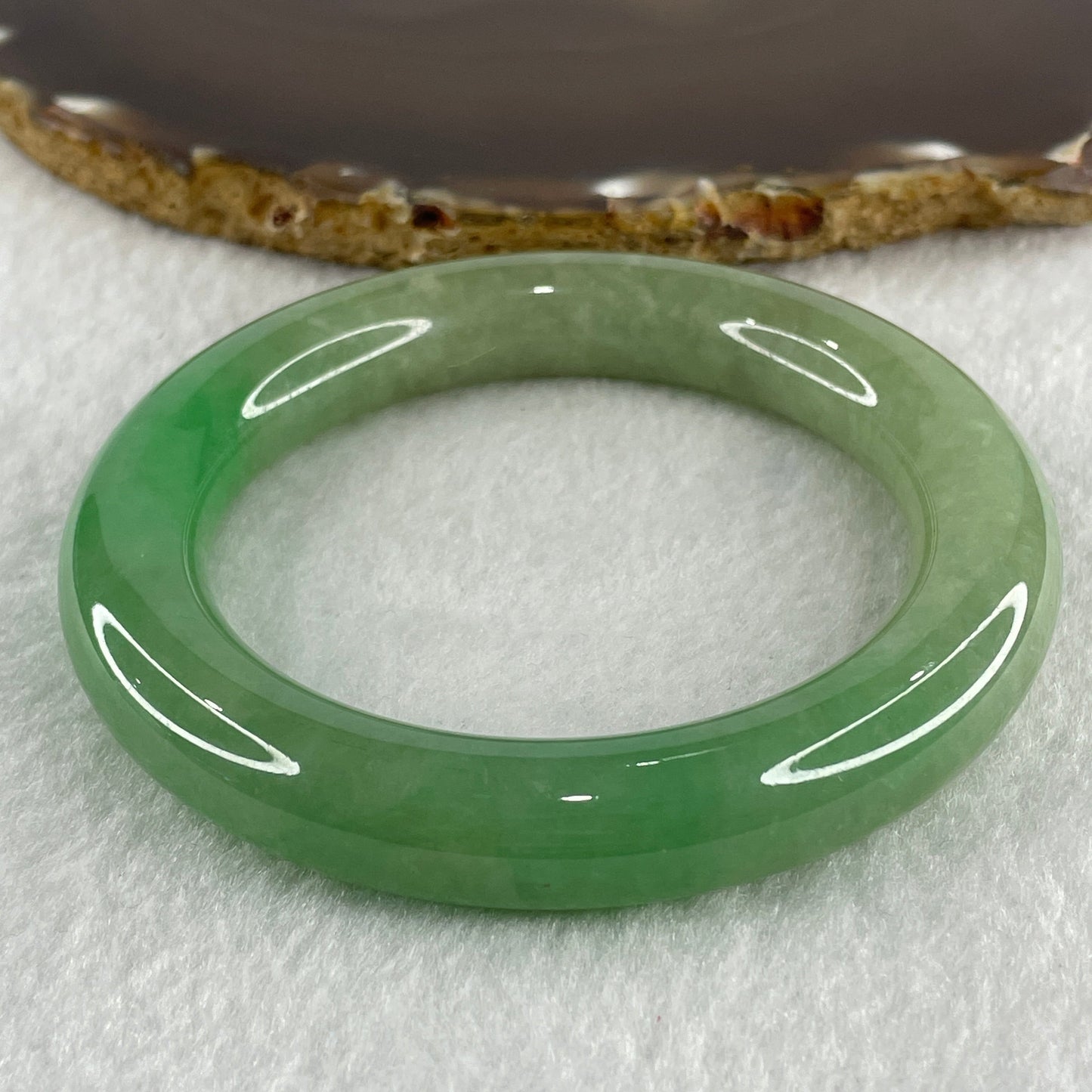 Type A Natural Jelly Full Green with Emerald Green Patches Jadeite Bangle 78.56g Inner Diameter 57.2mm 11.8 by 12.6mm (Close to Perfect)